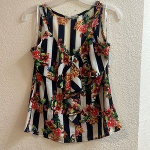 Sleeveless printed chiffon blouse with Olan on the front